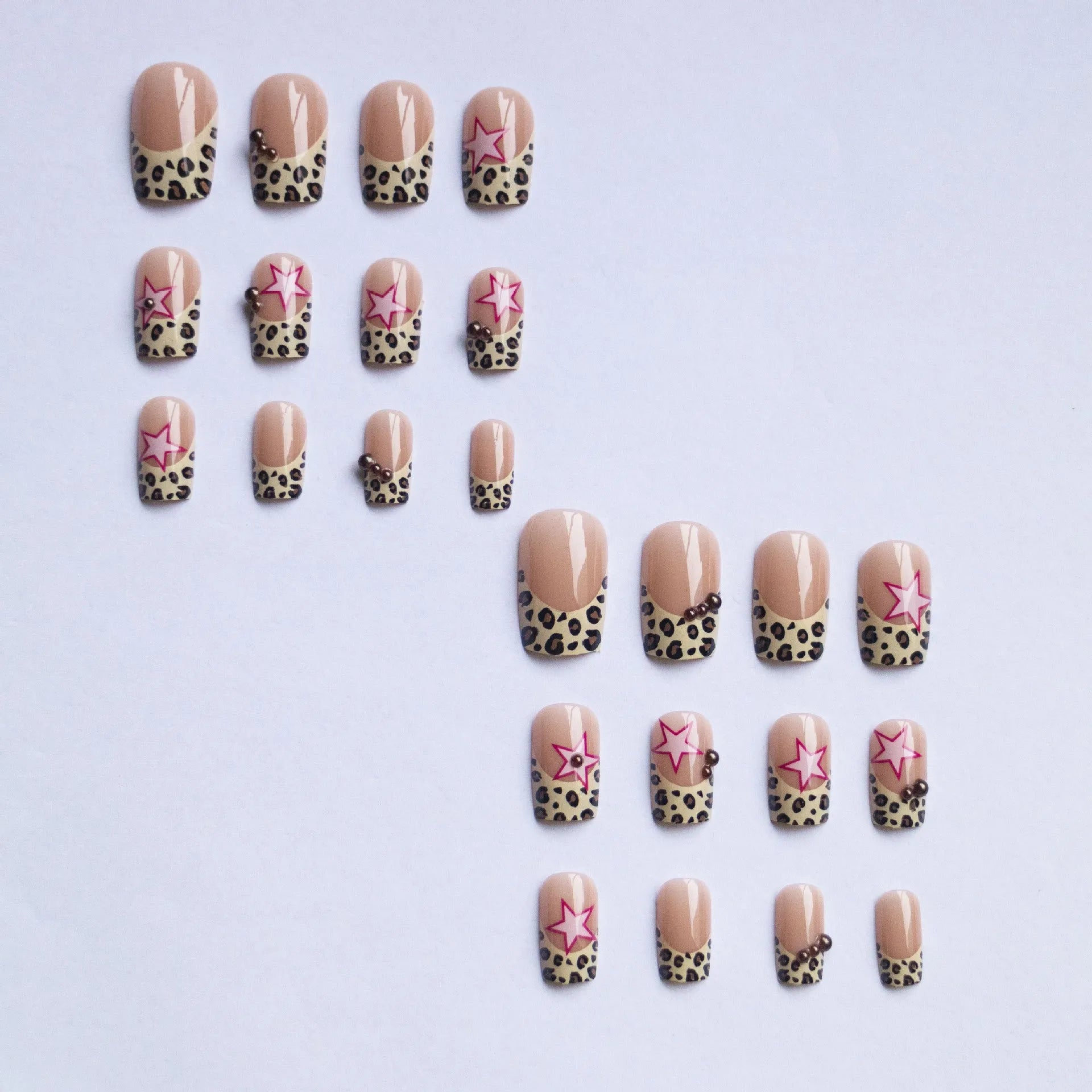Leopard print French manicure nail art stickers with rhinestone pearls and metallic five-pointed star accessories