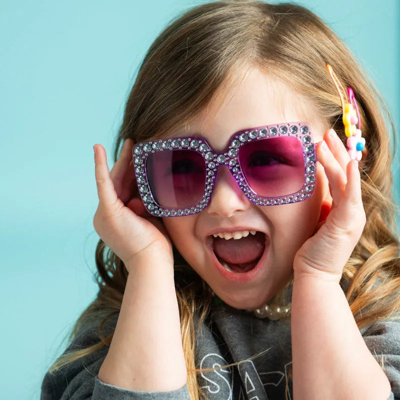 Plastic fashion sunglasses with personality styling in various colour combinations for sun protection
