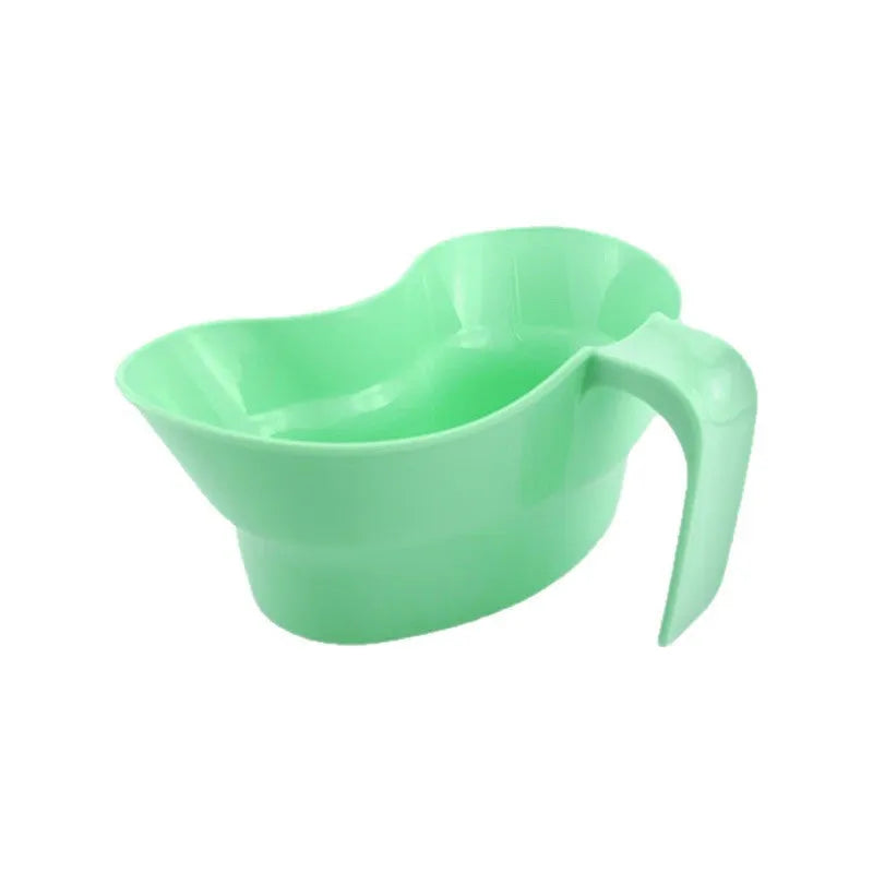 Green plastic nursing gargle cup with spout for bedridden patient drinking assistance