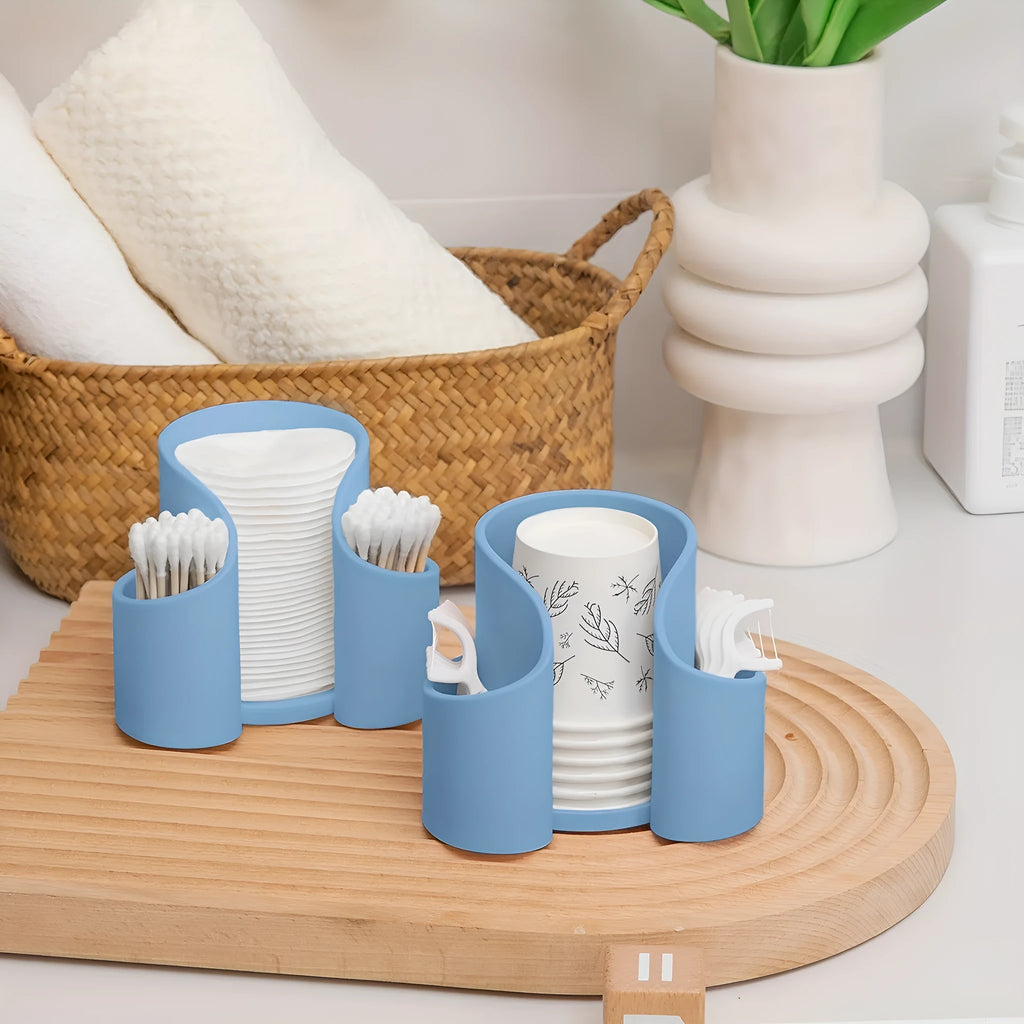 Modern dental floss storage box in plastic with solid colour finish available in pink, white, blue, and black