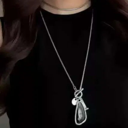 Women's long geometric pendant necklace with plaid pattern on snake bones chain for sweater layering