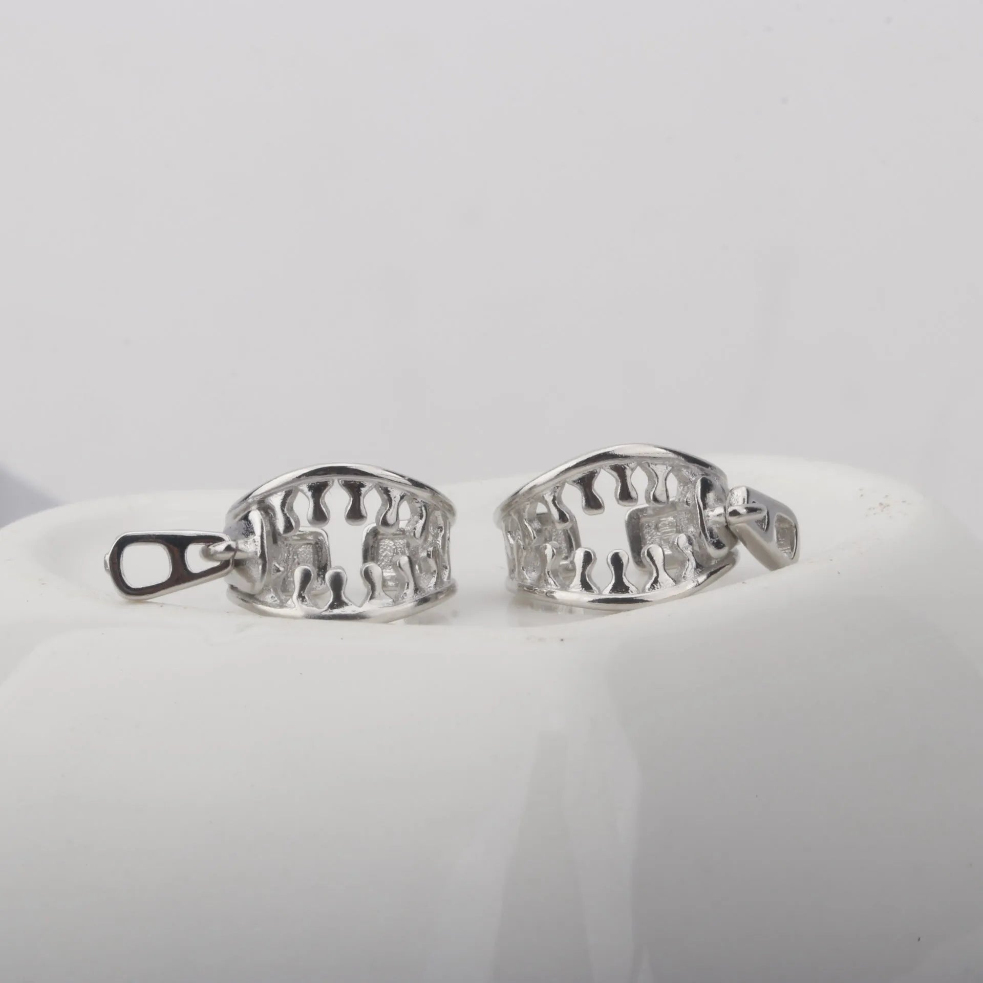 Copper geometric clip-on earrings with a simple zipper ear bone clip design in colour ES862.