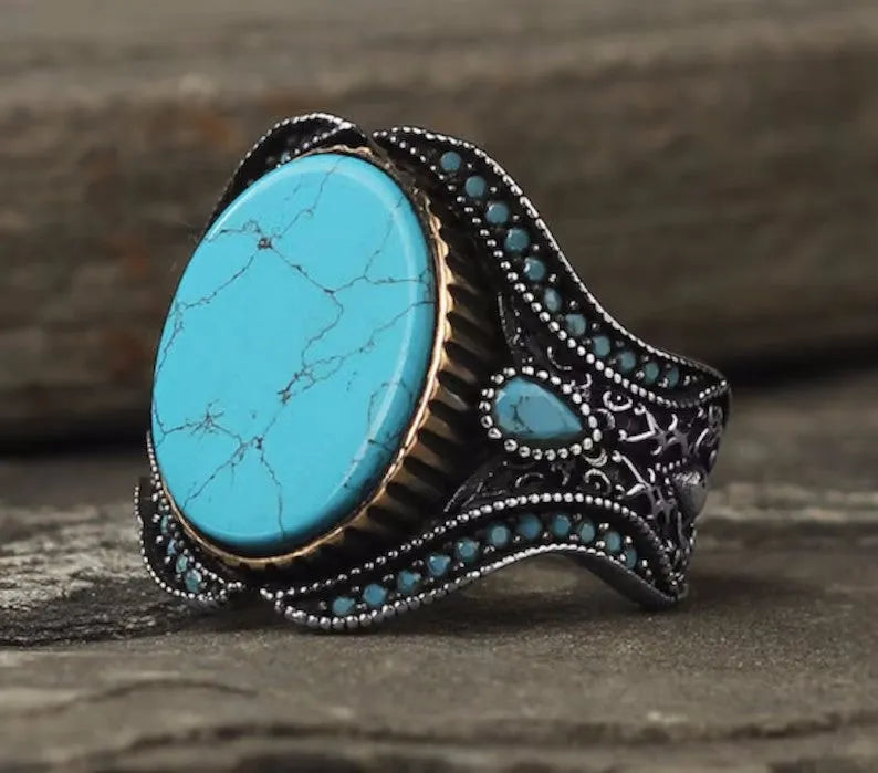 Men's antique silver alloy ring with turquoise stone on circular band