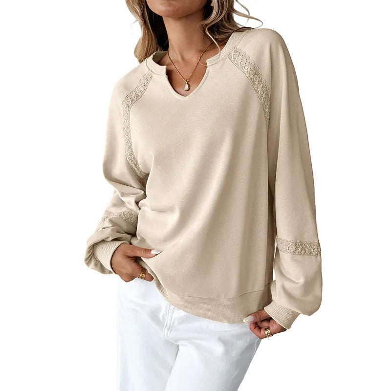 Women's loose fit cotton polyester sweater with half-open collar and decorative lace stitching on long sleeves