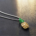 Silver-plated geometric pineapple pendant necklace on model