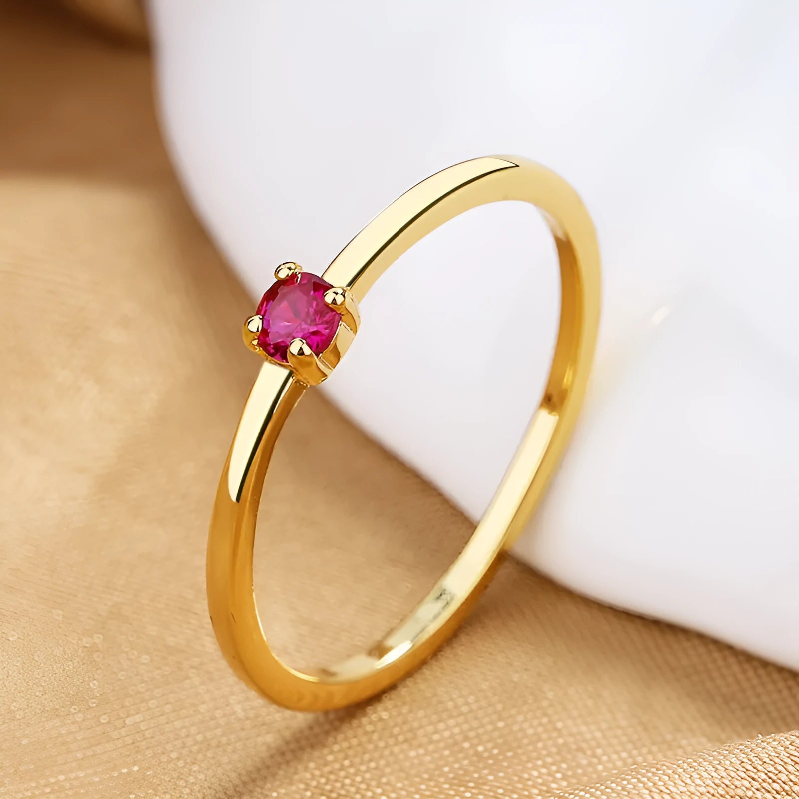 A personalised simple single diamond fine circle ring for women, made from copper, shown in a geometric round design.
