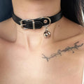 Black adjustable dog collar showing cat paw, bone and LD leather style options with measuring tape showing 21-50cm range