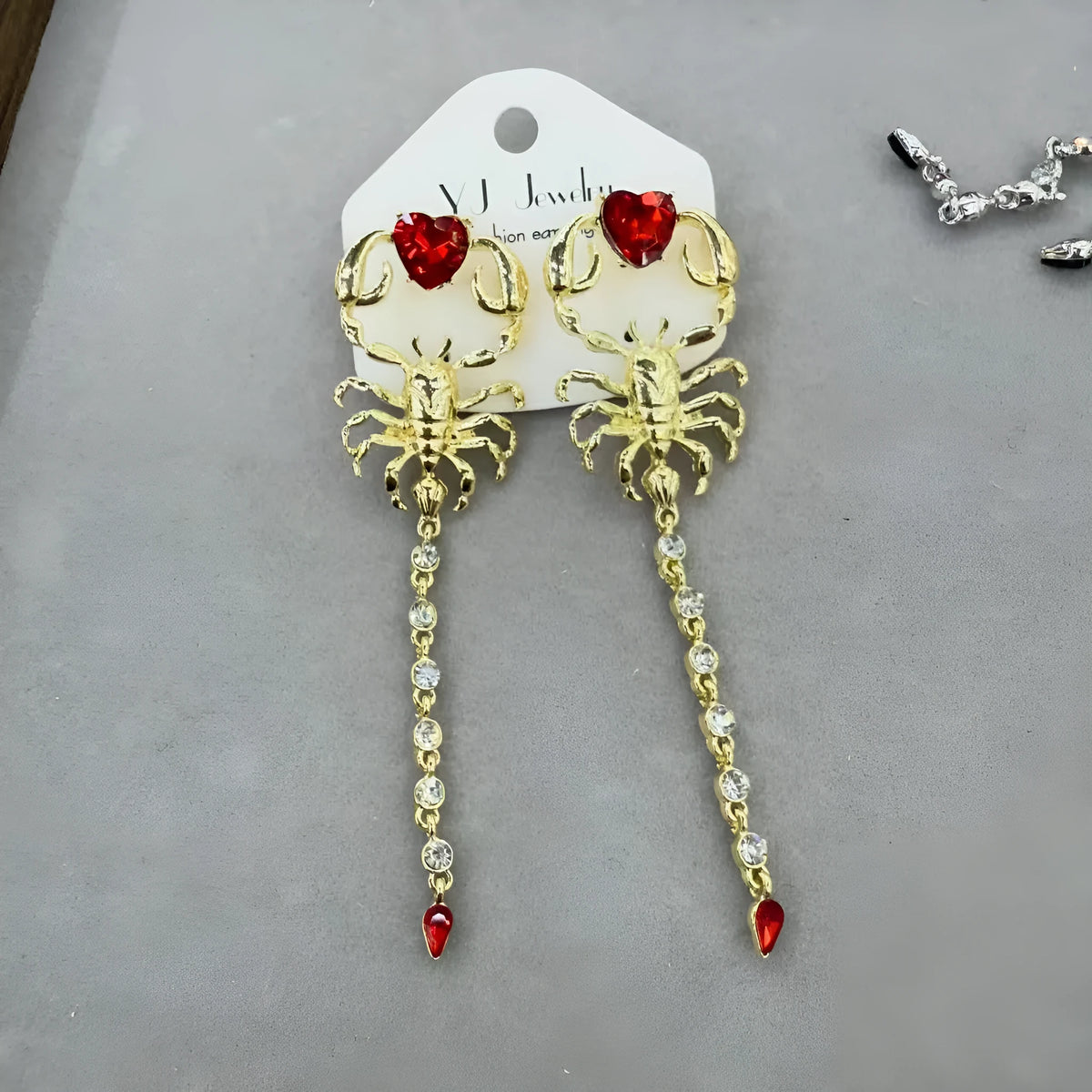 Exaggerated facial features asymmetric earrings for women in gold, alloy electroplated insect style