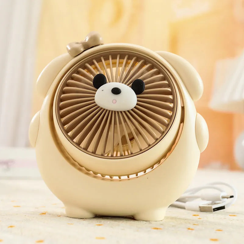 Dog-shaped desktop USB fan showing colour options including brown bear and pink puppy variants
