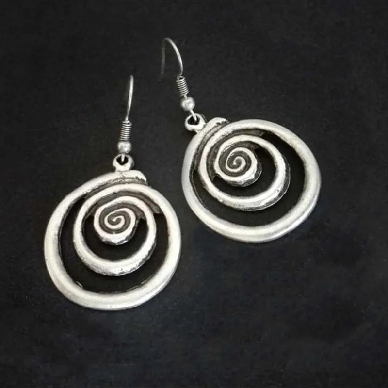 Geometric spiral earrings with distressed silver finish and national style details