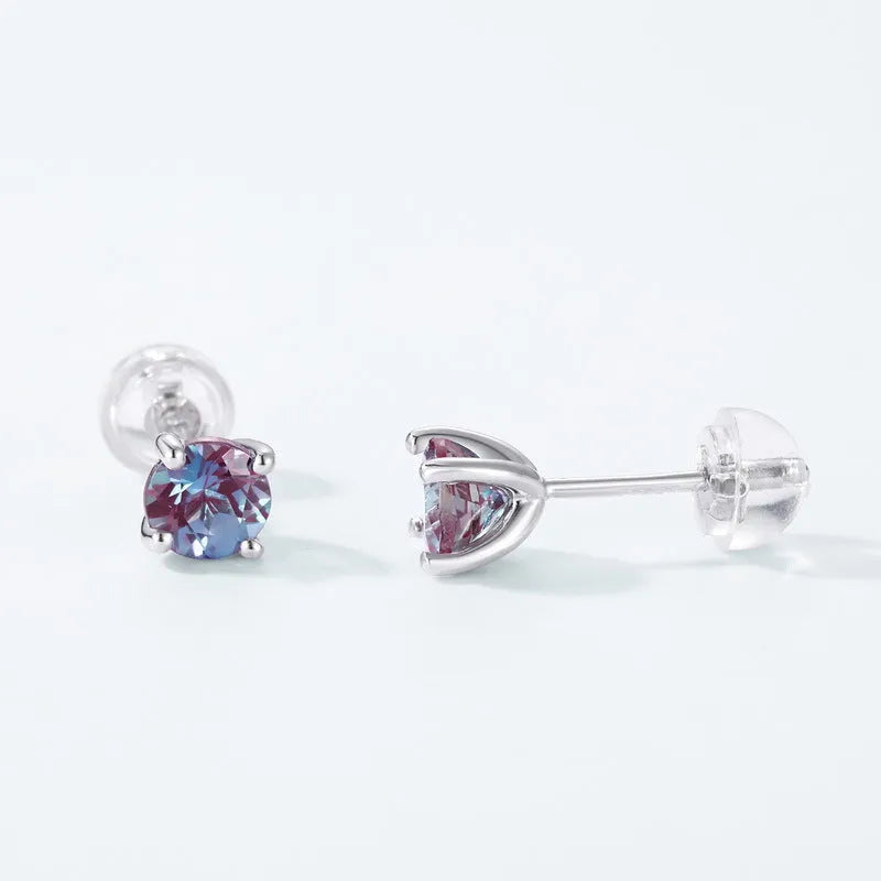 A pair of simple geometric Alexander stone ear studs in 925 silver with a round element, in cultivate Alexandrite colour.