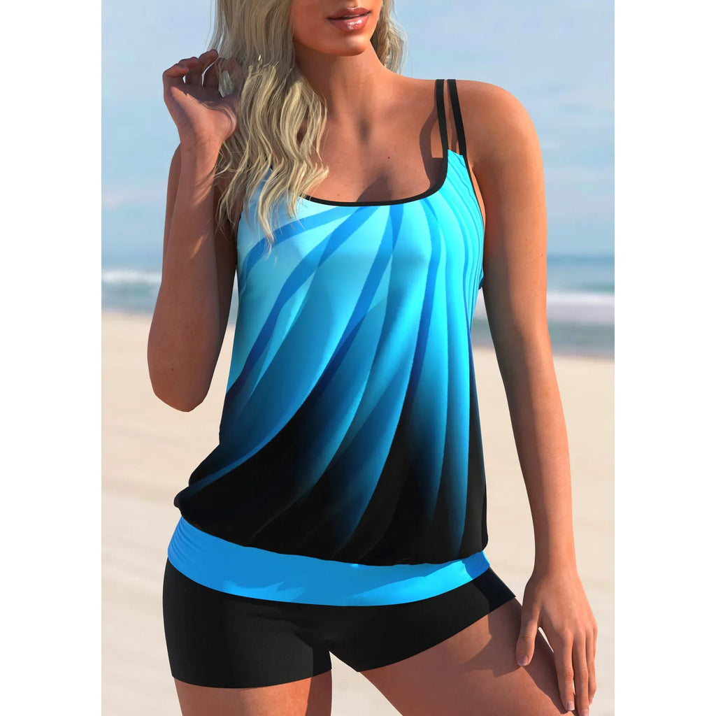 Plus size women's butterfly print swimsuit set with strap top and conservative beach shorts.
