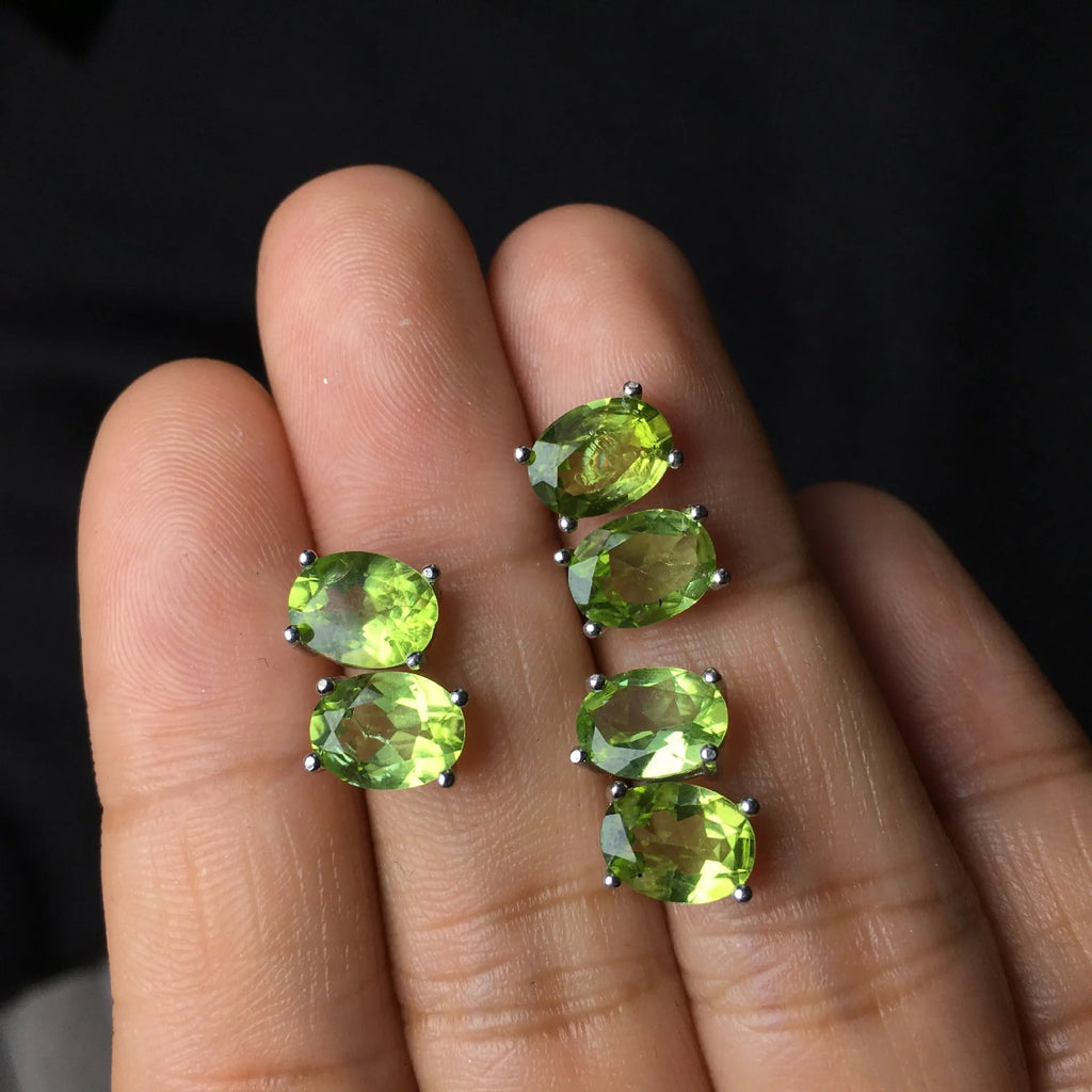 Natural grass green olivine faceted stud earrings in S925 silver, oval stone 6mm by 8mm.