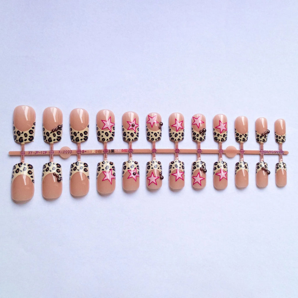 Leopard print French manicure nail art stickers with rhinestone pearls and metallic five-pointed star accessories