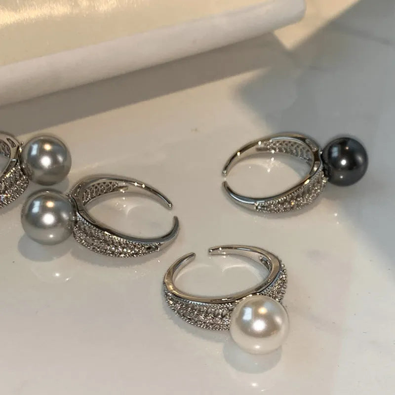 Geometric open copper ring for women with a black pearl style and adjustable opening