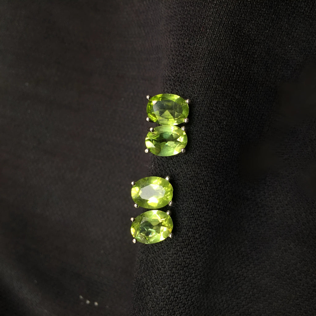Natural grass green olivine faceted stud earrings in S925 silver, oval stone 6mm by 8mm.
