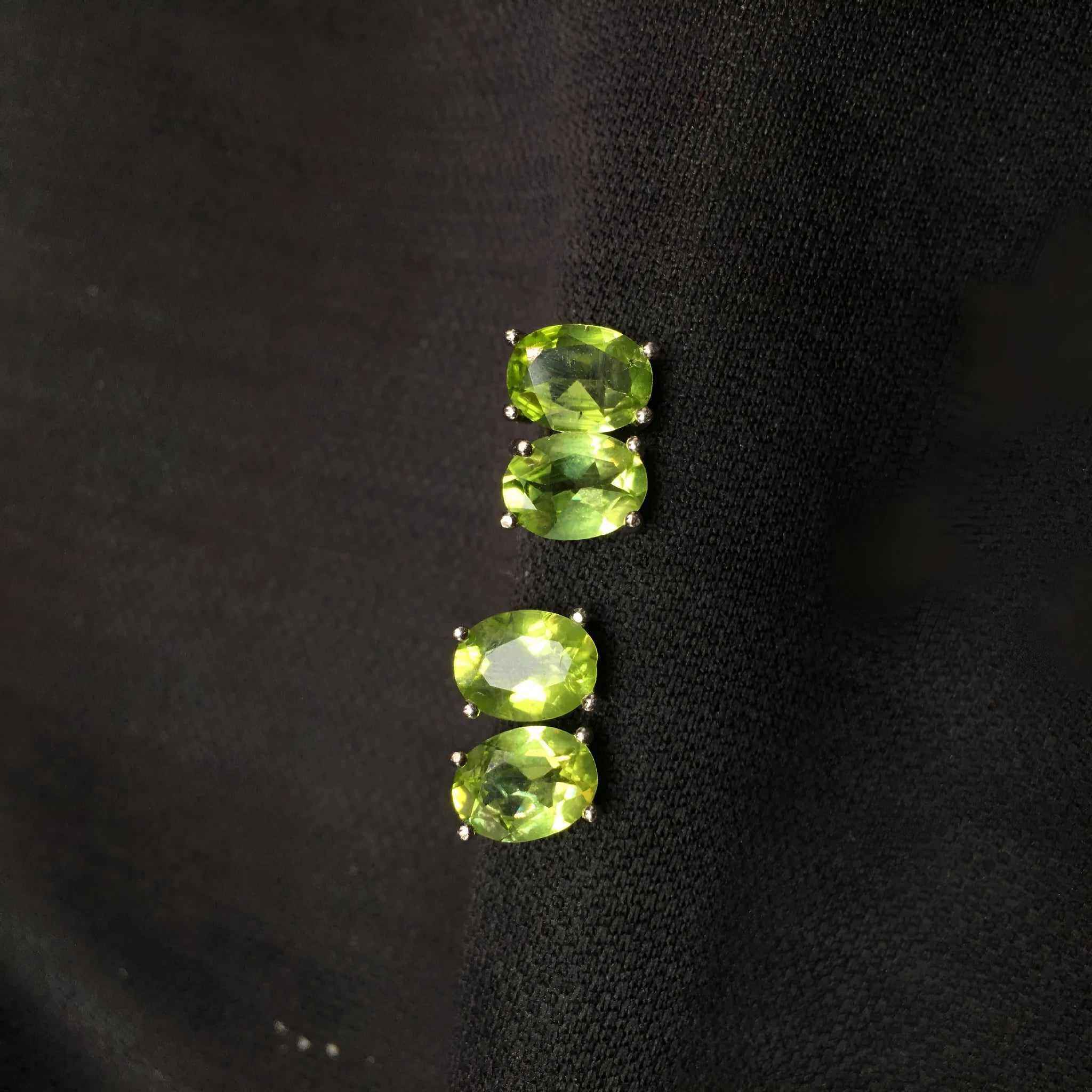 Natural grass green olivine faceted stud earrings in S925 silver, oval stone 6mm by 8mm.