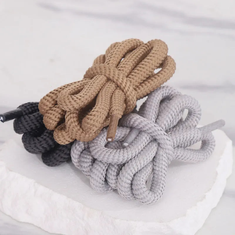 Flat oval woven shoelaces in various colours showing 1.0cm width and length options.