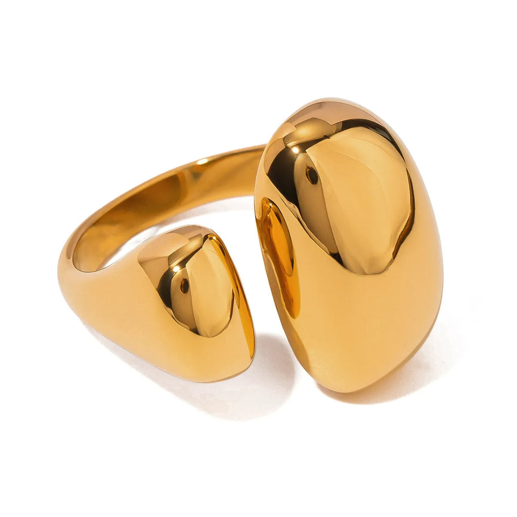 Women's exaggerated geometric open ring in stainless steel with electroplated finish.