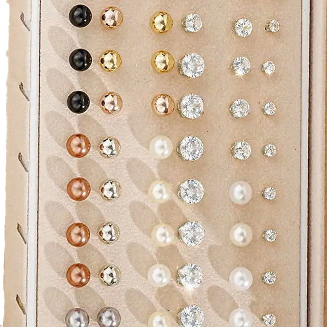 108 gold and yellow geometric and round alloy drop earrings laid out.