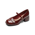 Womens mid-top patent leather ankle boots with a square toe and chunky block heel in apricot colour.