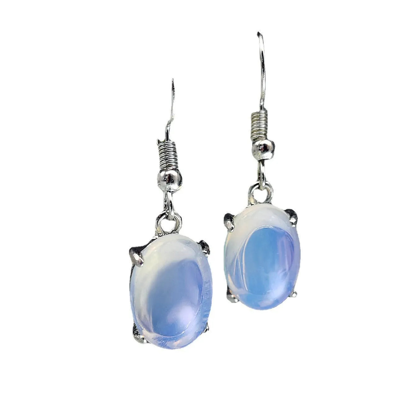 A pair of retro drop-shaped earrings with an opal moonstone colour and elliptical decorative elements.