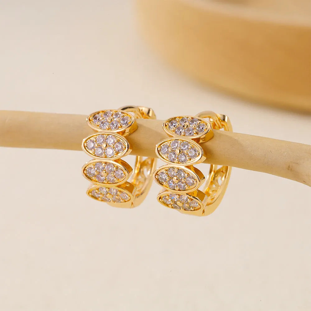 A pair of women's copper earrings with zircon stone inlay in a contemporary ins style, colour EH412018.
