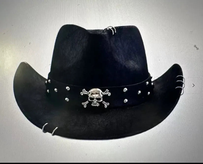 Brown leather velvet curved edge Western cowboy hat with a conical crown on a wooden surface.