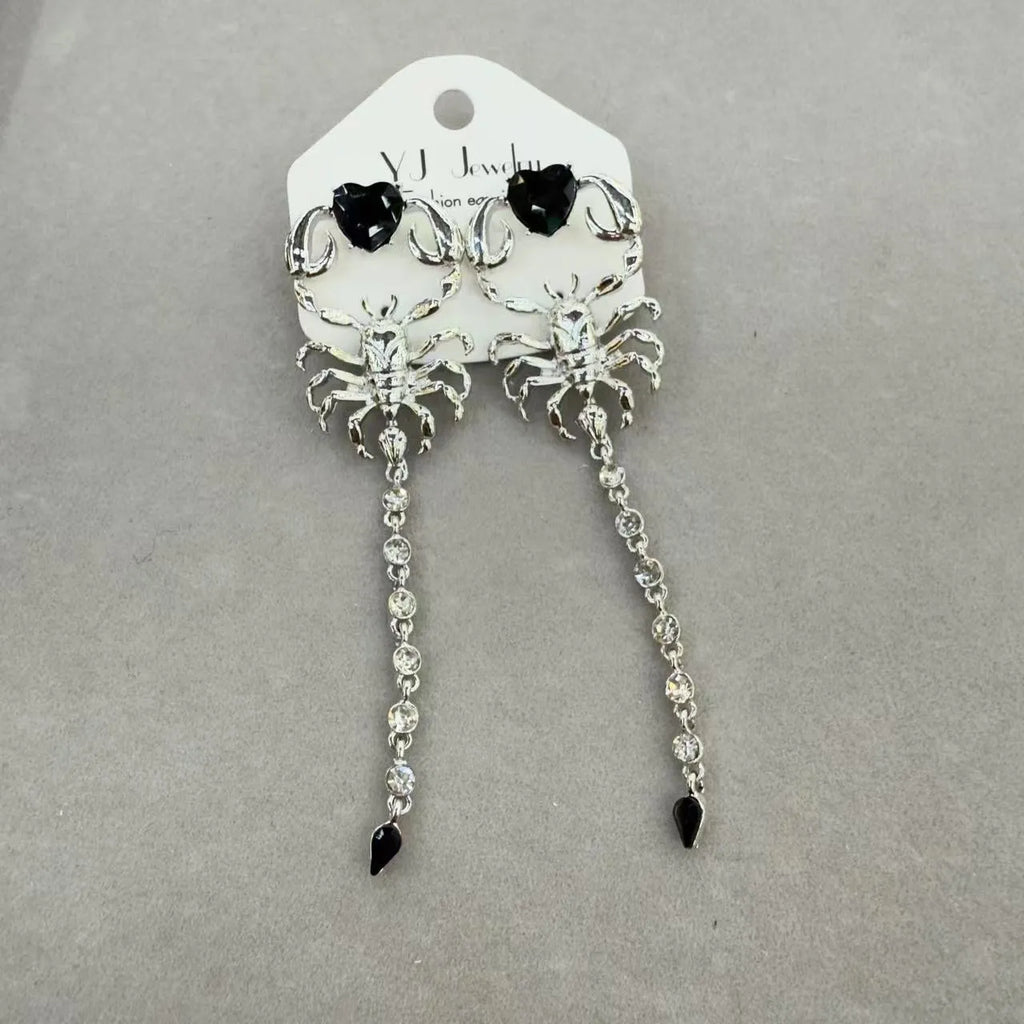 Exaggerated facial features asymmetric earrings for women in gold, alloy electroplated insect style