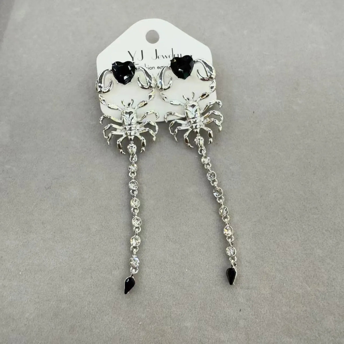 Exaggerated facial features asymmetric earrings for women in gold, alloy electroplated insect style