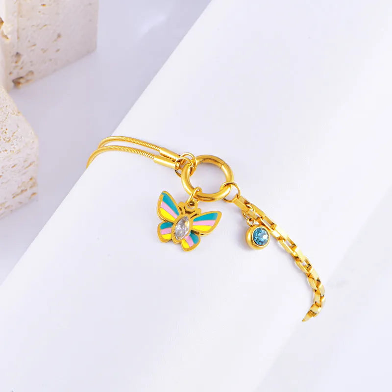 Gold titanium steel butterfly necklace and bracelet set with epoxy pendant and snake bone chain