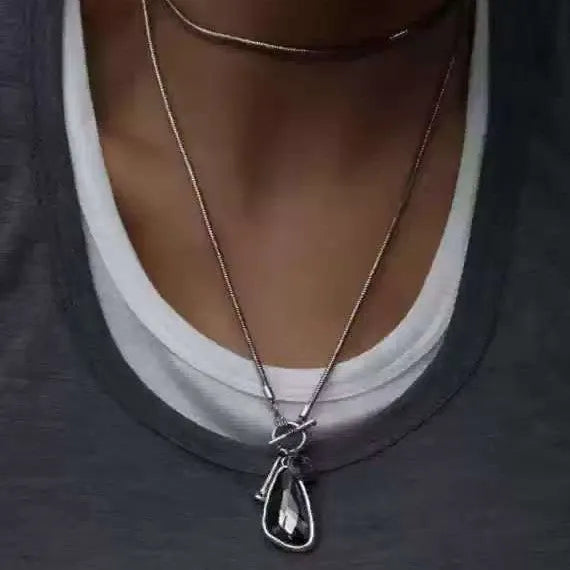 Women's long geometric pendant necklace with plaid pattern on snake bones chain for sweater layering