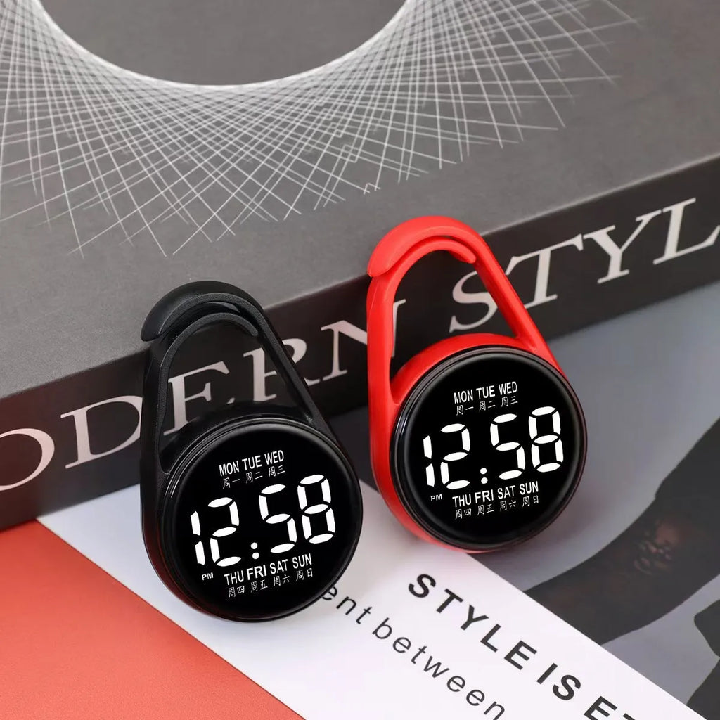 LED luminous digital watch with plastic strap in selected colour, showing number display on plastic mirror.