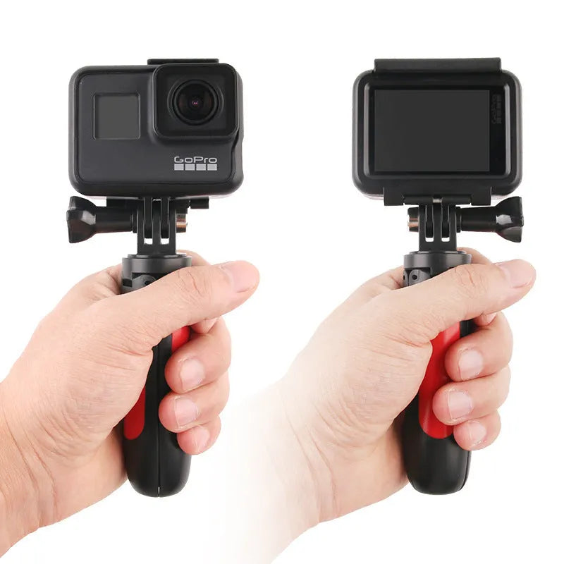 Mini telescopic selfie stick tripod expanded to full height with smartphone attached, ABS silicone, available in four colours