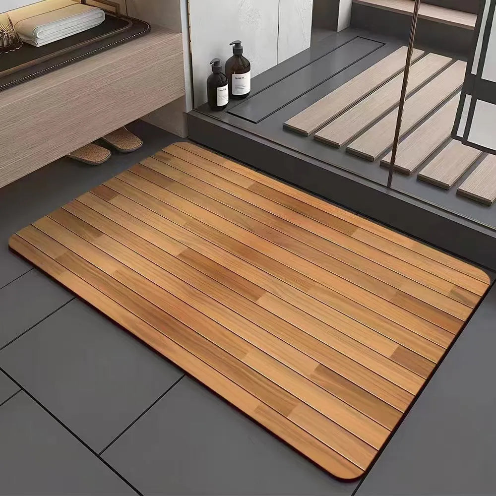 Square diatom ooze bathroom floor mat with wood grain geometric pattern on a tiled floor.