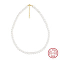 Women's adjustable silver necklace with natural freshwater pearls on a model