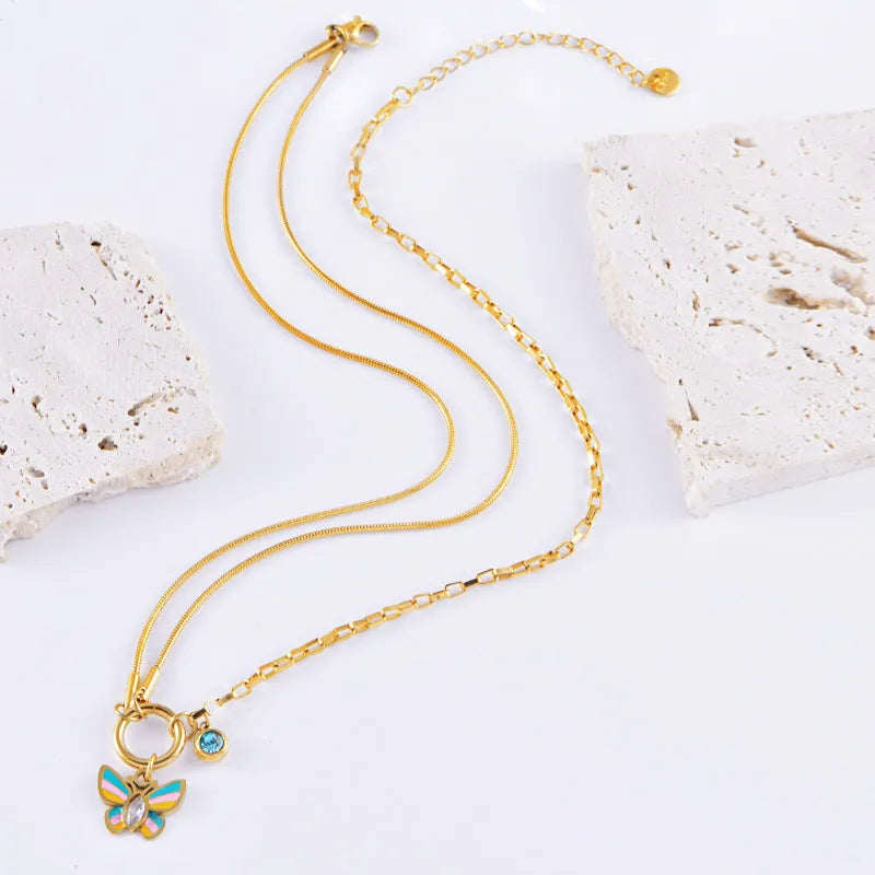 Gold titanium steel butterfly necklace and bracelet set with epoxy pendant and snake bone chain