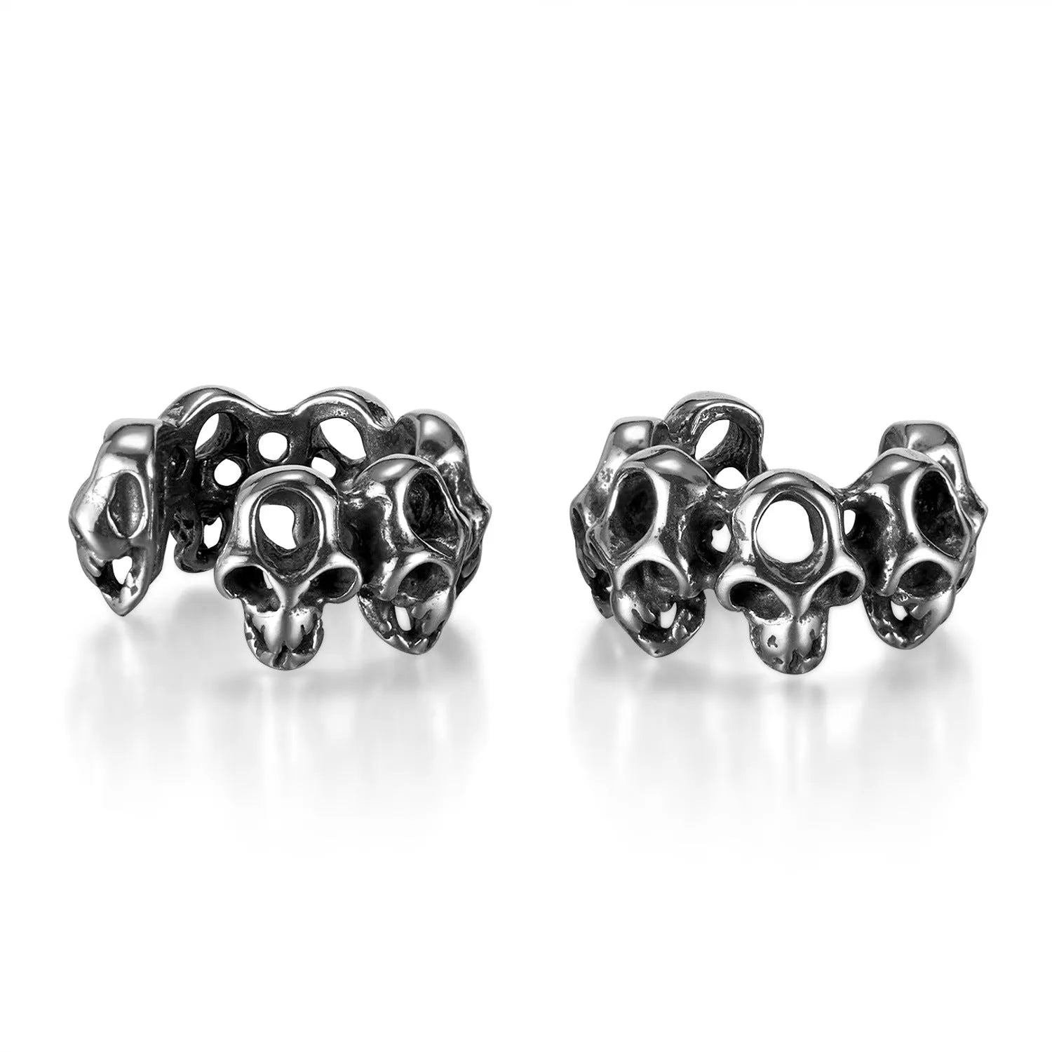 Stainless steel skull earrings with hollow geometric design and ear clip closure