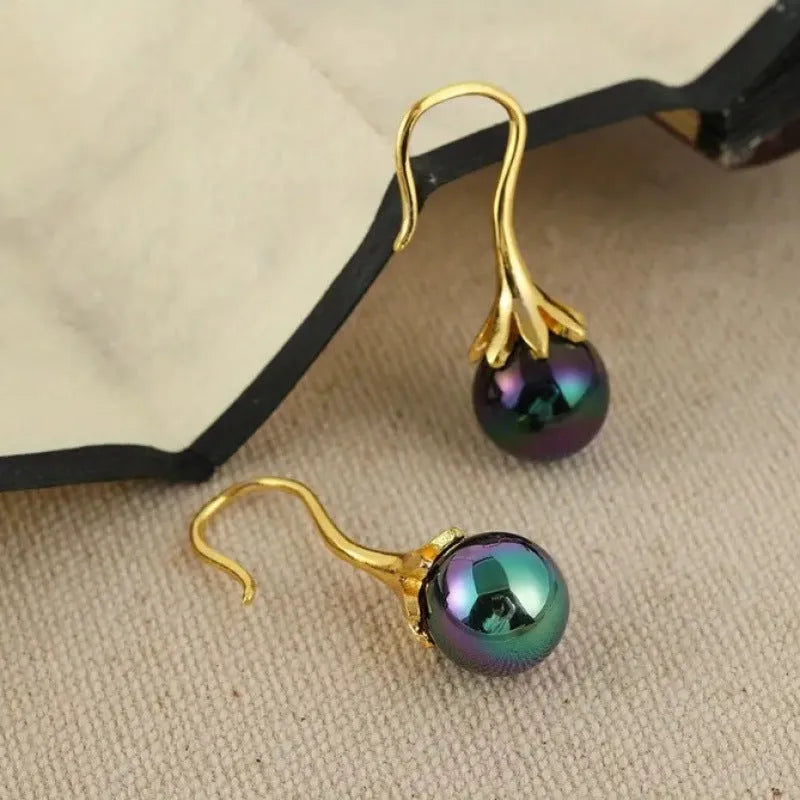 Gold electroplated retro fashion earrings for women with alloy construction