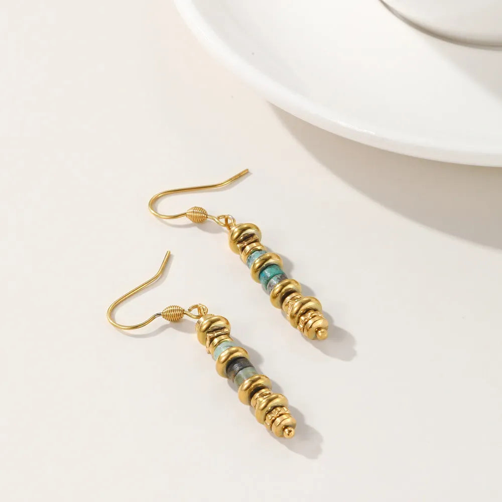 Women's silver geometric dangle earrings with retro design and titanium steel construction