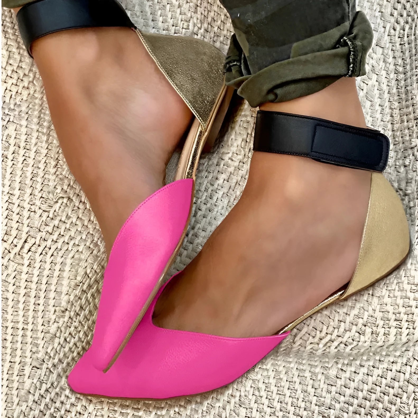 Women's beige velcro sandals with a hollowed flat design on a neutral background.
