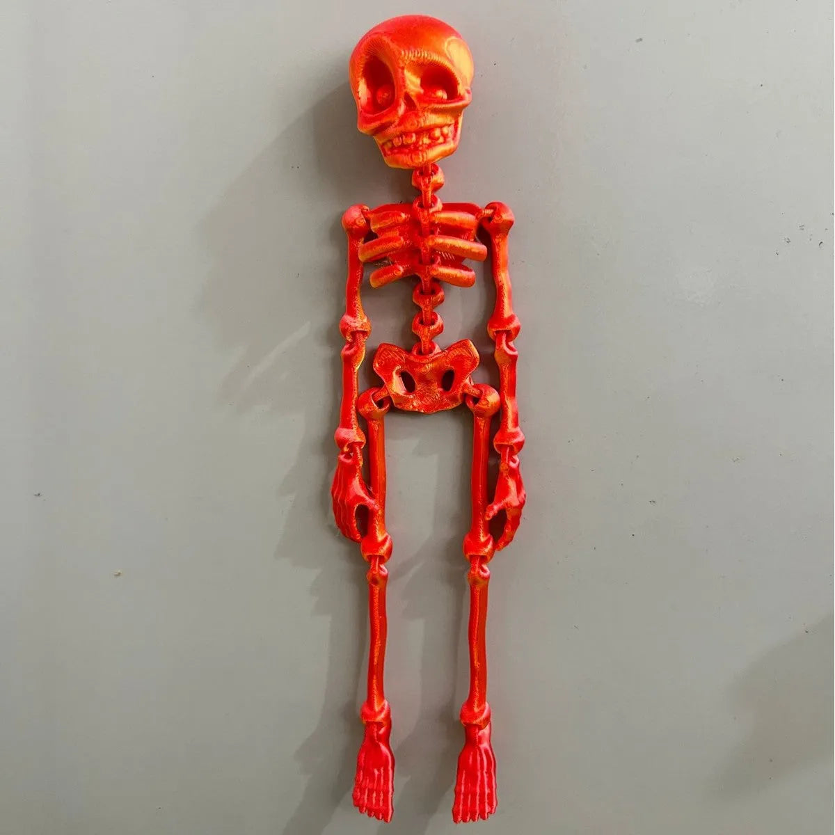 3D printed skull refrigerator magnet showing dimensional details and 18cm height proportions