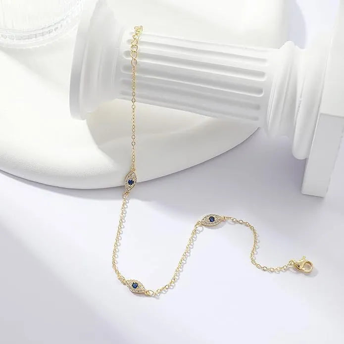 Gold alloy adjustable jeweled pendant anklet on ankle for summer casual wear