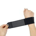 High elasticity breathable athletic wristguard for wrist support in black, grey, and pink.