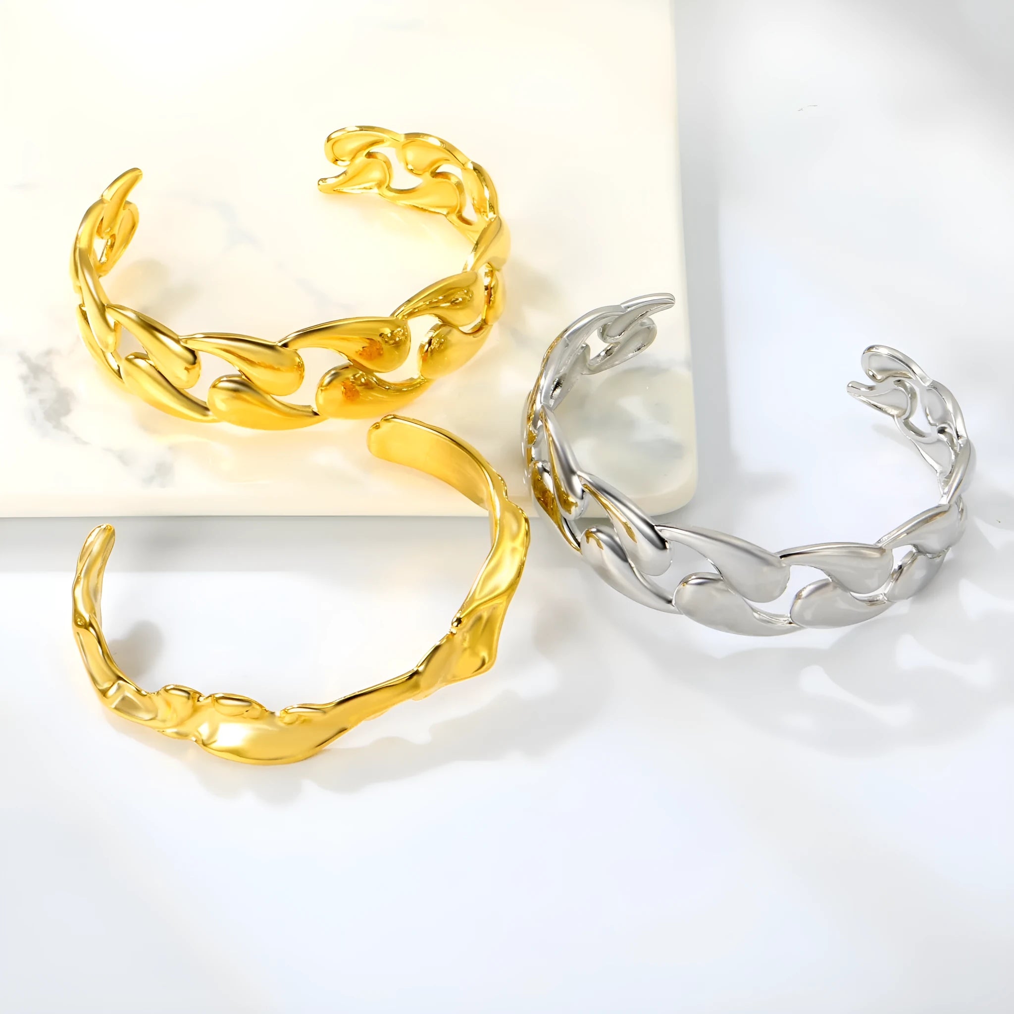 Modern stainless steel alloy bracelet on a wrist, shown in one of three available colour finishes.