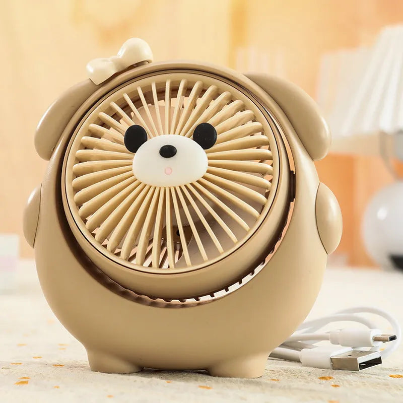 Dog-shaped desktop USB fan showing colour options including brown bear and pink puppy variants