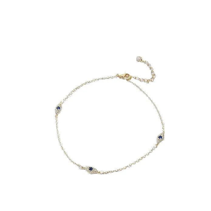 Gold alloy adjustable jeweled pendant anklet on ankle for summer casual wear