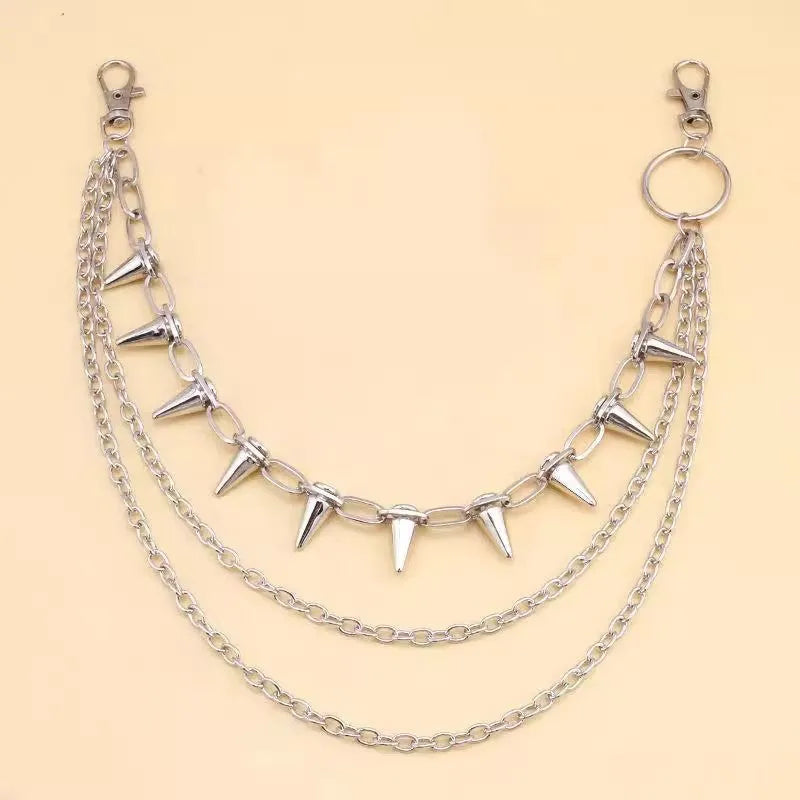 Silver alloy trousers chain with double layer design and rivet detailing, shown against dark fabric