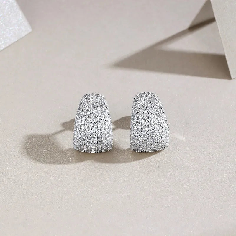 Geometric women's ear studs in sterling silver with moissanite stone accents