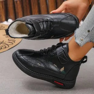 Women's black velvet house shoes with hollow-out design and rubber sole